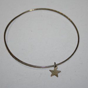 Pretty thin silver bangle bracelet with star charm 7"